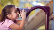 Girl Playing on Playground