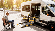 man in wheelchair getting into vehicle man in wheelchair getting into vehicle