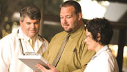Doctor checking girls heartbeat Doctor checking girls heartbeat