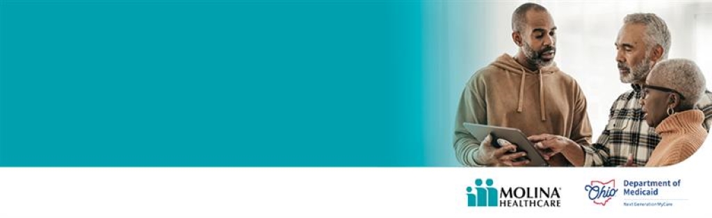 a man explaining information to an elderly couple