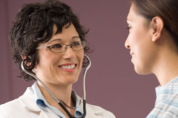 Doctor and patient smiling