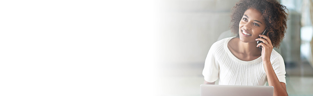 Hand posting sticky note reminder