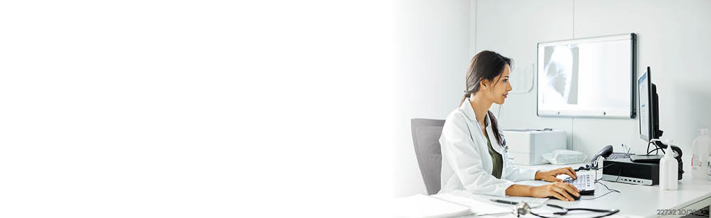 Female doctor working on a computer 