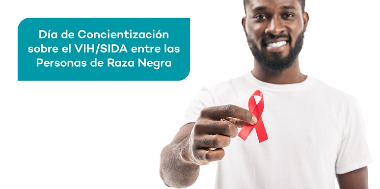 Hombre afroamericano sosteniendo una cinta roja