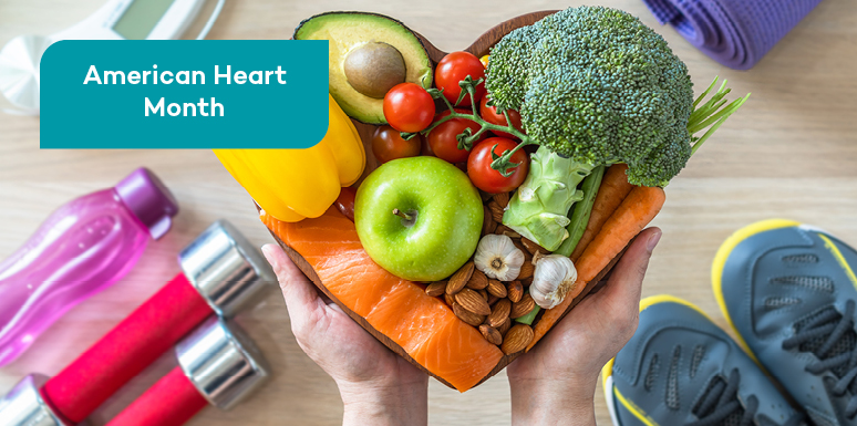 heart shaped plate full of fruits and vegetables