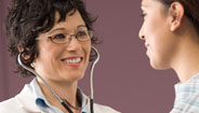 Doctor and patient smiling