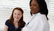 Doctor and patient smiling