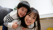 Mother and son smiling