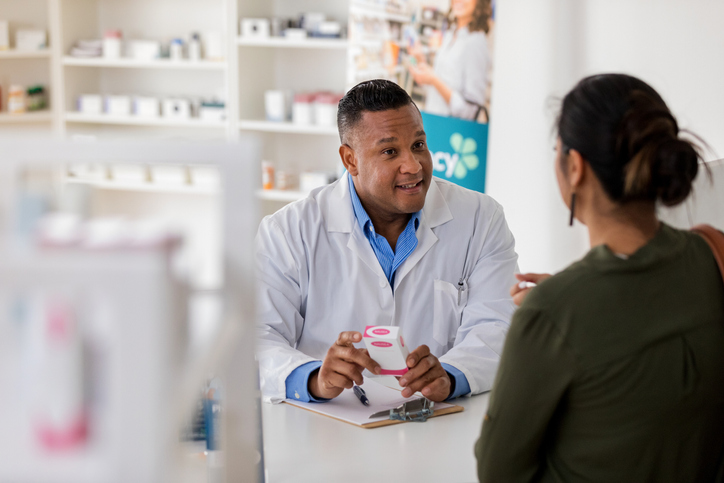 pharmacist with patient