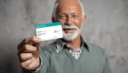 man holding ID card