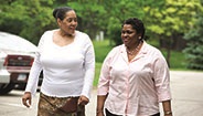 Two woman walking Two woman walking