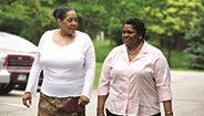 Two woman walking