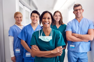 five doctors smiling