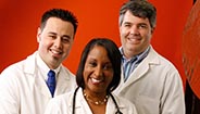 Three doctors smiling Three doctors smiling