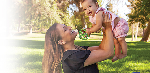 woman holding baby woman holding baby