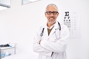 Doctor giving eye exam Doctor giving eye exam