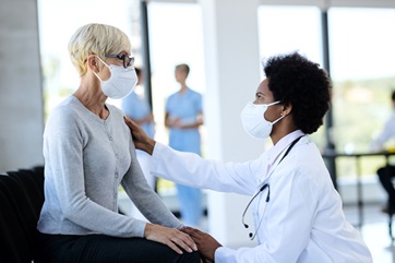 female doctor talking to female patient