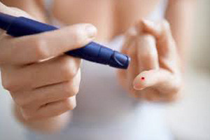 Diabetic lancet device pricking finger.