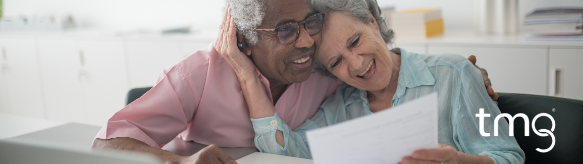 couple looking at papers